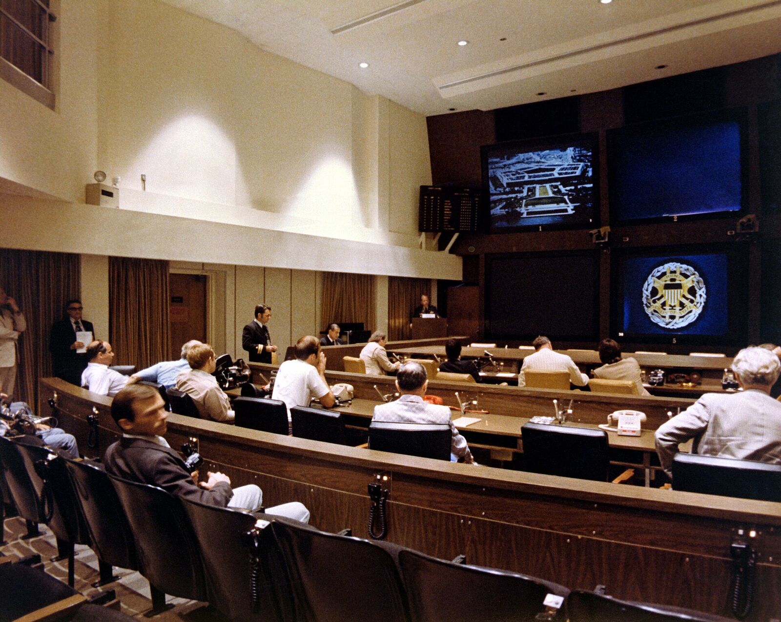 Military command centre operations floor with status displays